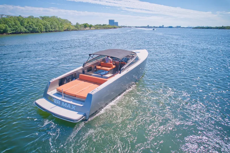 Slide: The Image of 2015 VanDutch 40 luxury yacht cruising on a sunny day. - 18