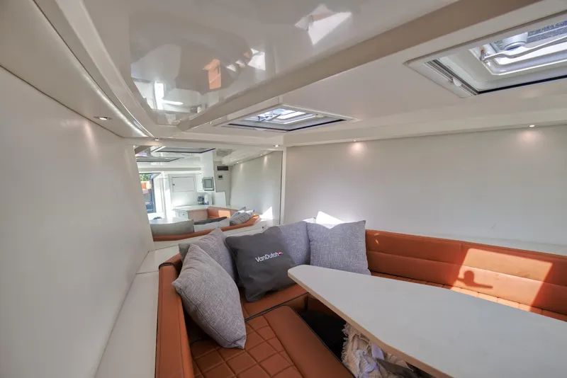 Slide: The Image of Interior of 2015 VanDutch 40 yacht with modern seating and skylights. - 36