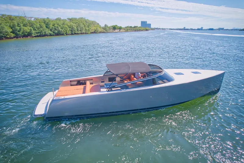 Slide: The Image of 2015 VanDutch 40 luxury yacht cruising on a sunny day. - 4