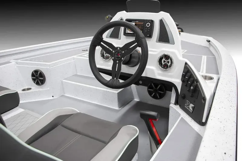 Slide: The Image of Manufacturer Provided Image: 2026 Xpress H18C Crappie boat interior with steering wheel and control panel. - 7
