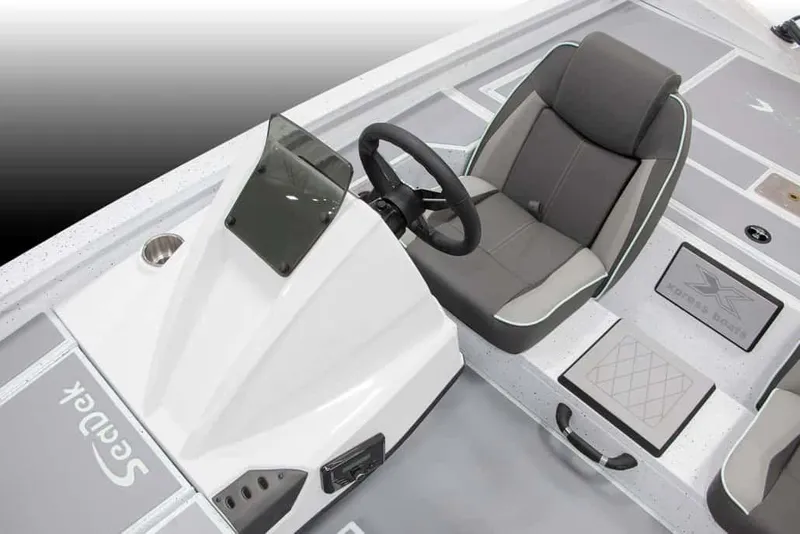 Slide: The Image of Manufacturer Provided Image: 2026 Xpress H18C Crappie boat interior with steering wheel and seating. - 8