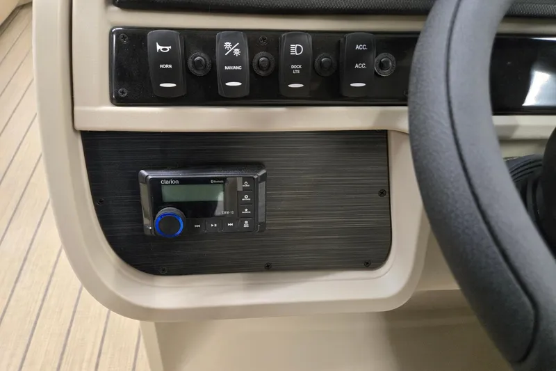 Slide: The Image of Control panel of 2026 Godfrey Sweetwater 2286 DT boat with Clarion audio system. - 11