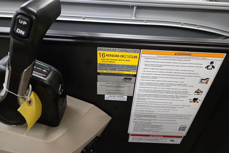 Slide: The Image of Boat control panel with capacity warning for Godfrey Sweetwater 2286 DT, 2026 model. - 14