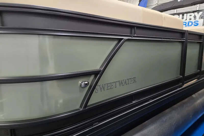 Slide: The Image of 2026 Godfrey Sweetwater 2286 DT pontoon boat side view with sleek design. - 3