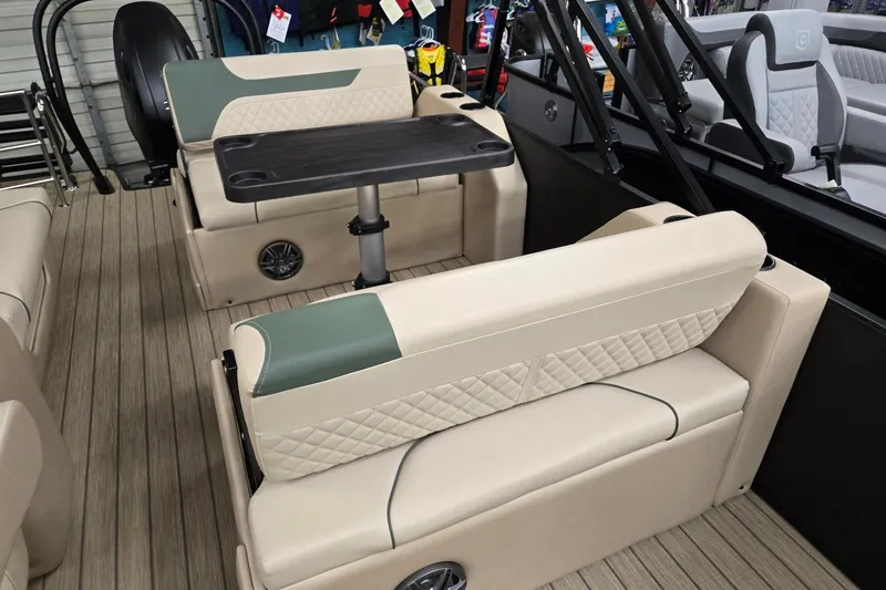 Slide: The Image of Interior of 2026 Godfrey Sweetwater 2286 DT pontoon boat with seating and table. - 8