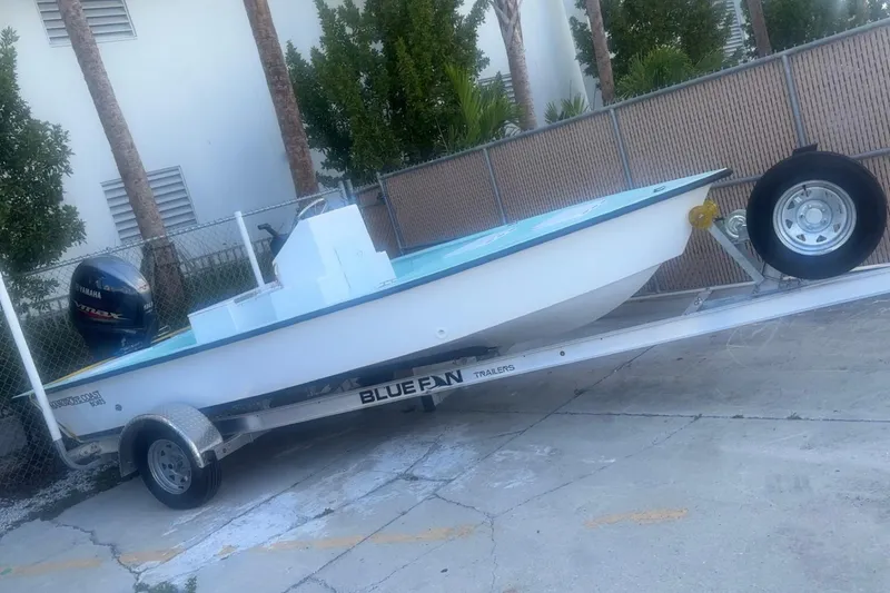 The Image of 2025 Mangrove Coast Boats 1700 Harbor Hawk on trailer, parked outdoors. - 1