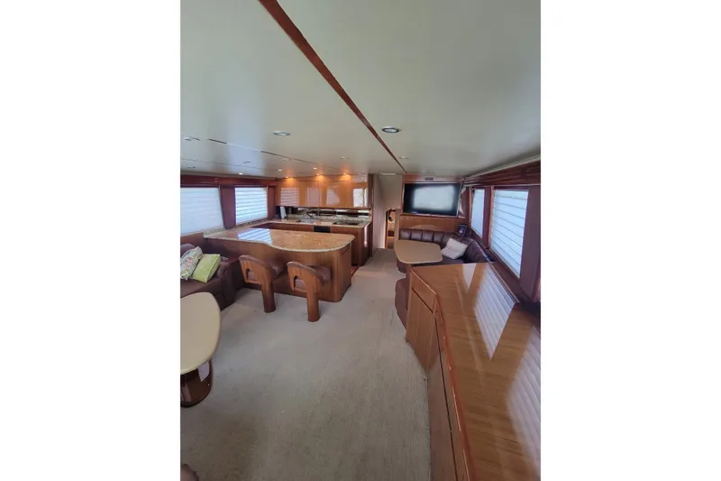 Slide: The Image of Luxurious interior of 2012 Viking 64c yacht with elegant wood finishes and modern amenities. - 26