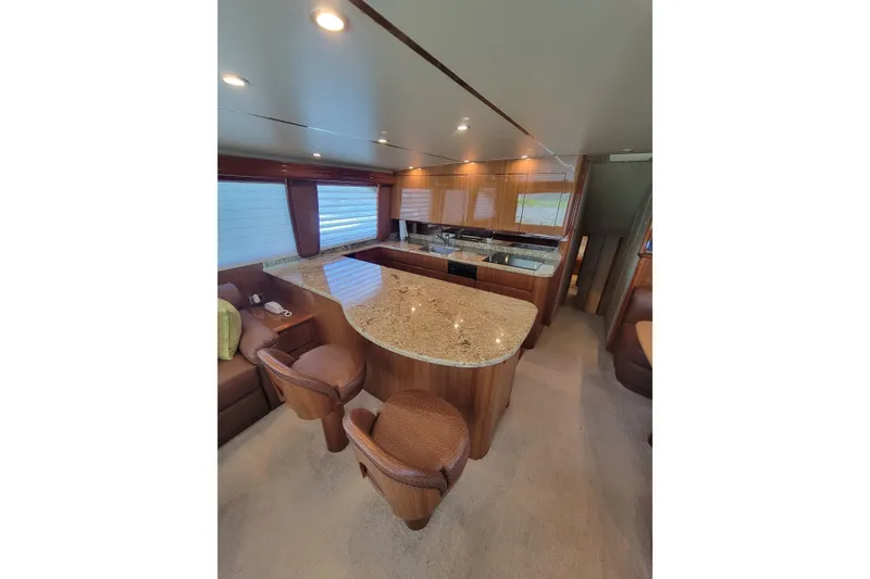 Slide: The Image of Luxurious interior of 2012 Viking 64c yacht with elegant wood and granite finishes. - 27