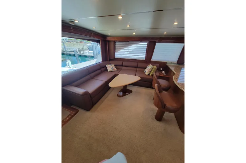 Slide: The Image of Luxurious interior of 2012 Viking 64c yacht with plush seating and elegant decor. - 29