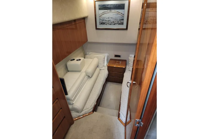 Slide: The Image of Luxurious cabin interior of 2012 Viking 64c yacht with elegant wood finishes. - 44