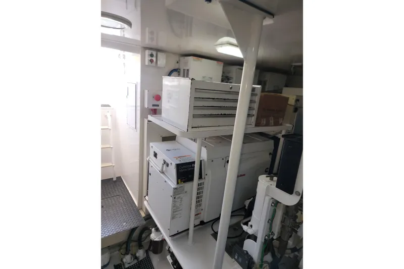 Slide: The Image of Engine room of 2012 Viking 64c yacht with Cummins Onan marine generator. - 59