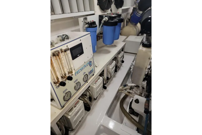 Slide: The Image of Engine room of 2012 Viking 64c yacht with Fresh Plus water filtration system. - 62