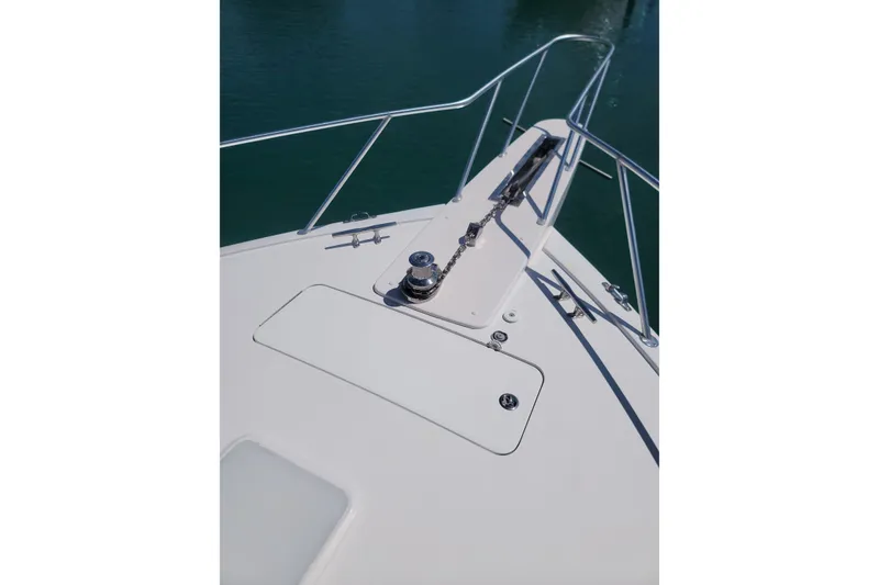 Slide: The Image of Bow of 2012 Viking 64c yacht with anchor chain and railing. - 7