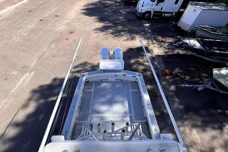 Slide: The Image of 2005 Mirage SF32 Center Console boat parked on a street, viewed from above. - 29