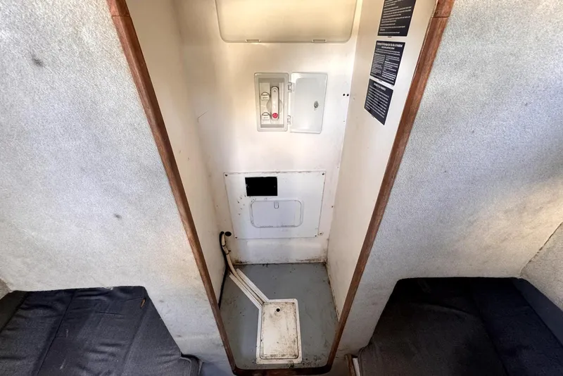 Slide: The Image of 2005 Mirage SF32 Center Console interior with control panel and seating area. - 32