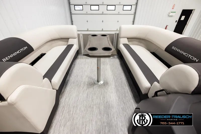 Slide: The Image of 2026 Bennington 22 SSRSF boat interior with plush seating and cup holders. - 19