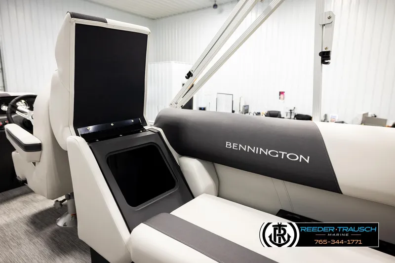 Slide: The Image of 2026 Bennington 22 SSRSF boat interior with storage compartment and seating. - 24