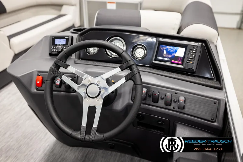 Slide: The Image of 2026 Bennington 22 SSRSF boat dashboard with steering wheel and control panel. - 27
