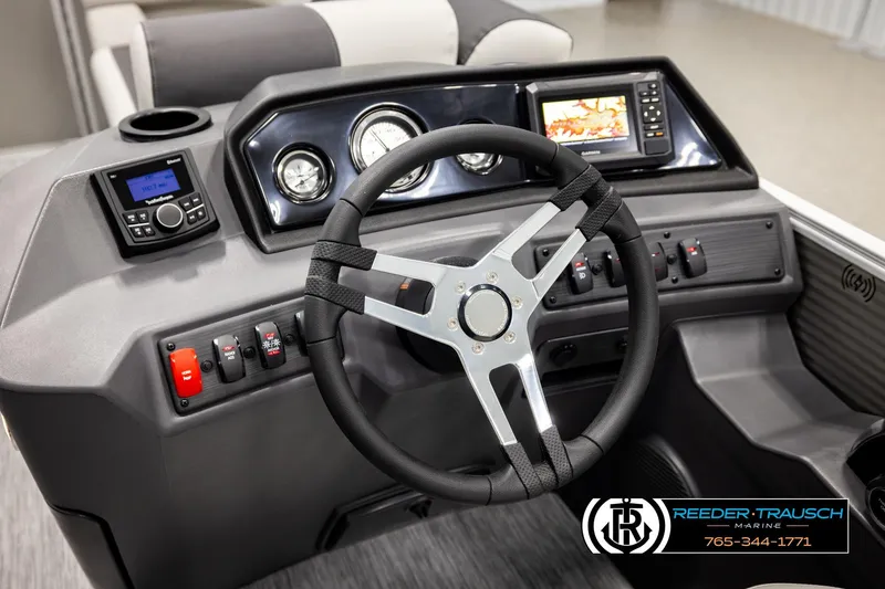Slide: The Image of 2026 Bennington 22 SSRSF boat dashboard with steering wheel and control panel. - 28