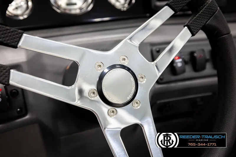 Slide: The Image of Steering wheel of 2026 Bennington 22 SSRSF boat, featuring sleek metallic design. - 29