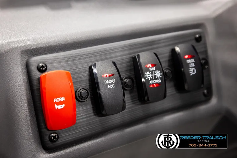 Slide: The Image of Control panel of 2026 Bennington 22 SSRSF boat with labeled switches. - 30