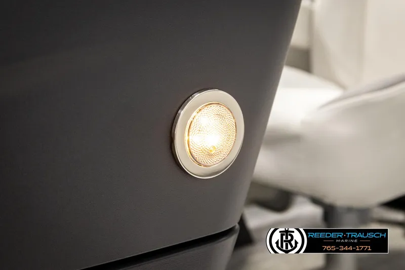 Slide: The Image of 2026 Bennington 22 SSRSF boat interior light detail with Reeder-Trausch Marine logo. - 43