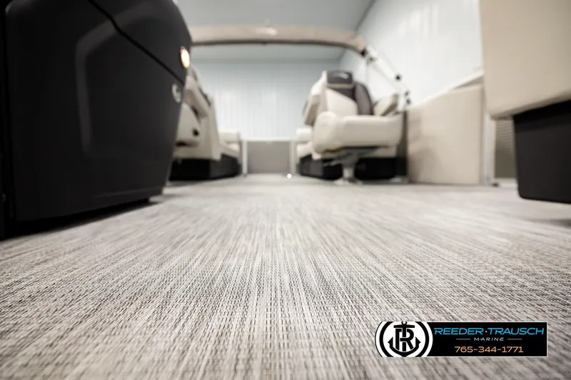 Slide: The Image of 2026 Bennington 22 SSRSF pontoon interior with modern flooring and seating. - 45