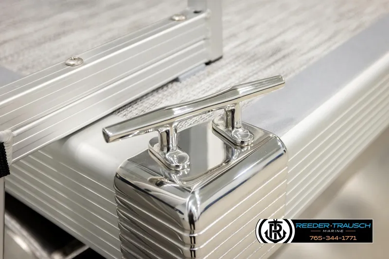 Slide: The Image of 2026 Bennington 22 SSRSF boat cleat detail, Reeder-Trausch Marine logo visible. - 49