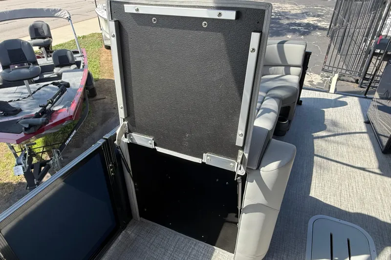 Slide: The Image of 2026 Avalon LSZ 25 Quad Lounge interior with seating and storage features. - 10