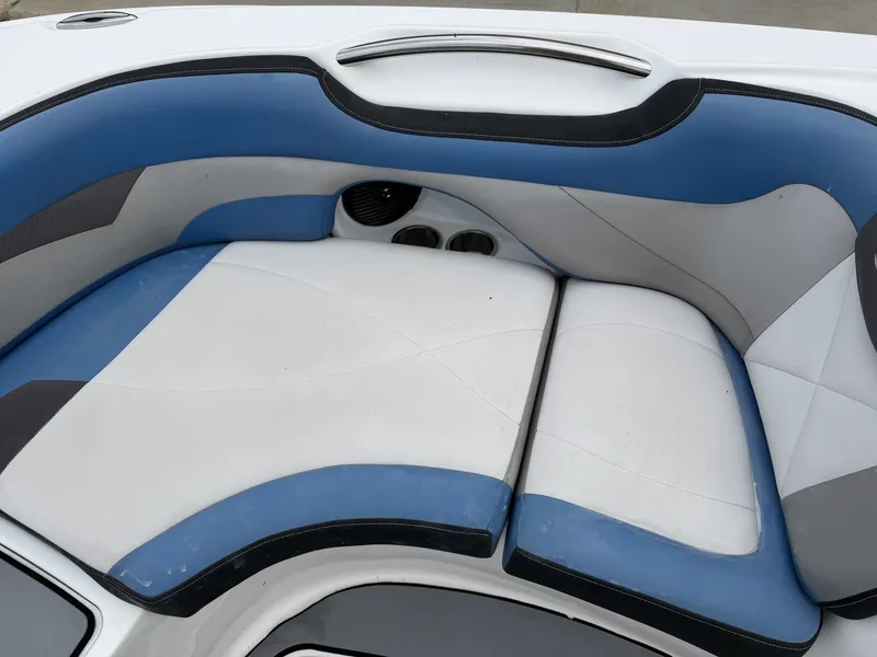 Slide: The Image of Interior of a 2015 Hurricane SS203 CROSSFIR boat, blue and white upholstery. - 13