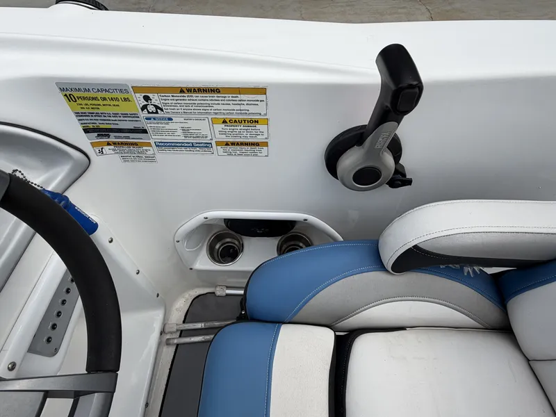 Slide: The Image of Interior of a 2015 Hurricane SS203 CROSSFIR boat with controls. - 22