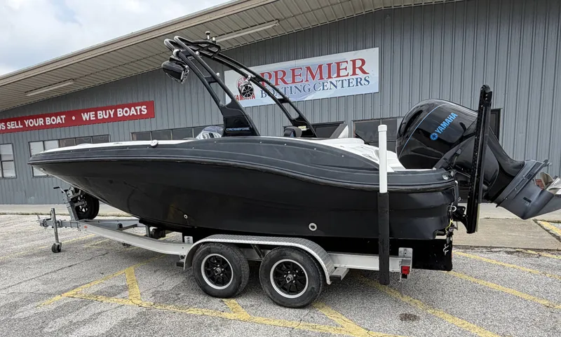 Slide: The Image of 2015 Hurricane SS203 CROSSFIR boat on trailer outside sales center. - 5