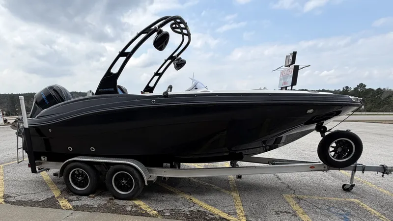 Slide: The Image of 2015 Hurricane SS203 CROSSFIR boat on trailer outdoors. - 7