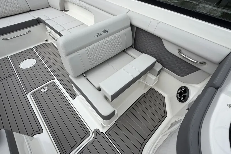 Slide: The Image of Interior of the Sea Ray SDX 290 Outboard with gray upholstery and sleek details. - 21