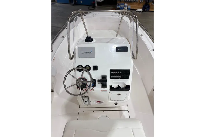 Slide: The Image of 2021 Edgewater 188CC boat console with Garmin navigation system and steering wheel. - 11