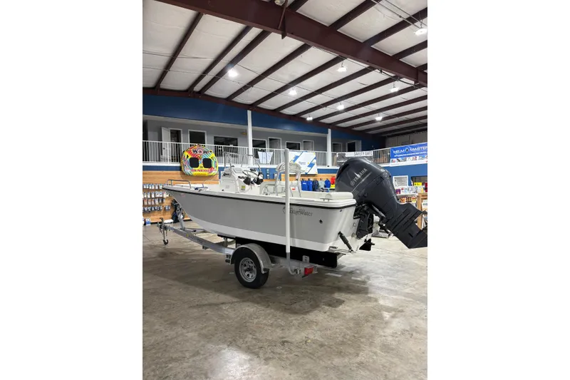 Slide: The Image of 2021 Edgewater 188CC boat on trailer in indoor showroom. - 3