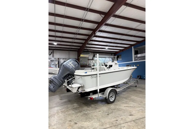 Slide: The Image of 2021 Edgewater 188CC boat with Yamaha engine in indoor storage. - 4