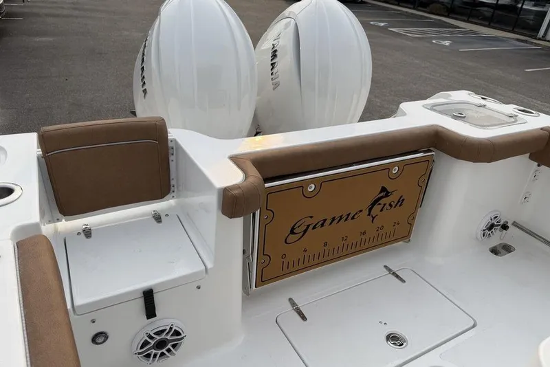 Slide: The Image of 2026 Sea Hunt Gamefish 25 boat interior with seating and storage compartments. - 16