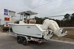Slide: The Image of 2026 Sea Hunt Gamefish 25 boat on trailer at Marine Service Center. - 4