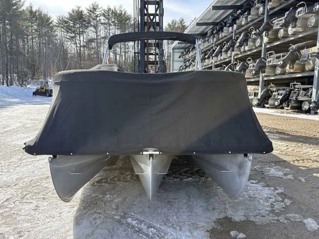 Slide: The Image of 2020 Harris Cruiser 210 pontoon boat with cover outdoors. - 2