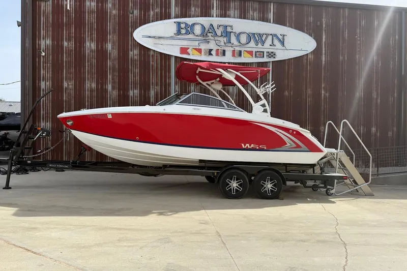 The Image of 2017 Cobalt R3 WSS Surf boat in red on trailer at Boat Town. - 0