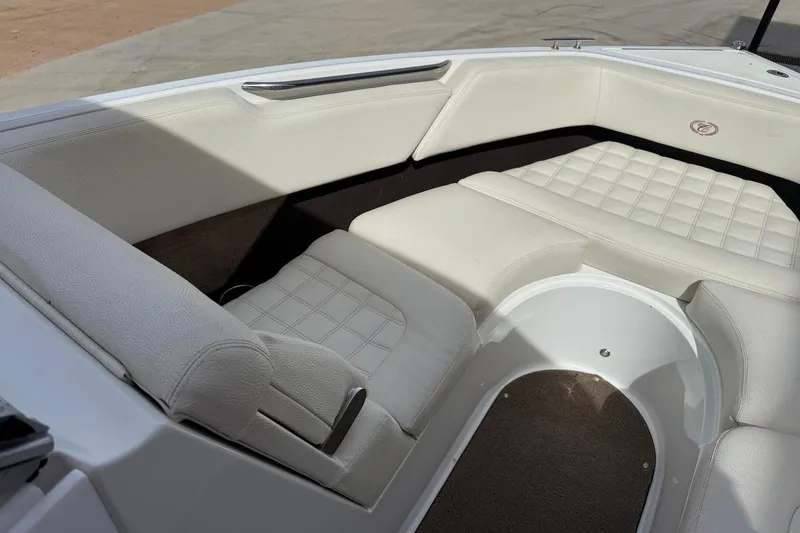 Slide: The Image of 2017 Cobalt R3 WSS Surf boat interior with white cushioned seating. - 13