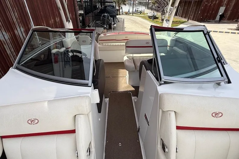 Slide: The Image of 2017 Cobalt R3 WSS Surf boat interior with white seating and red accents. - 15