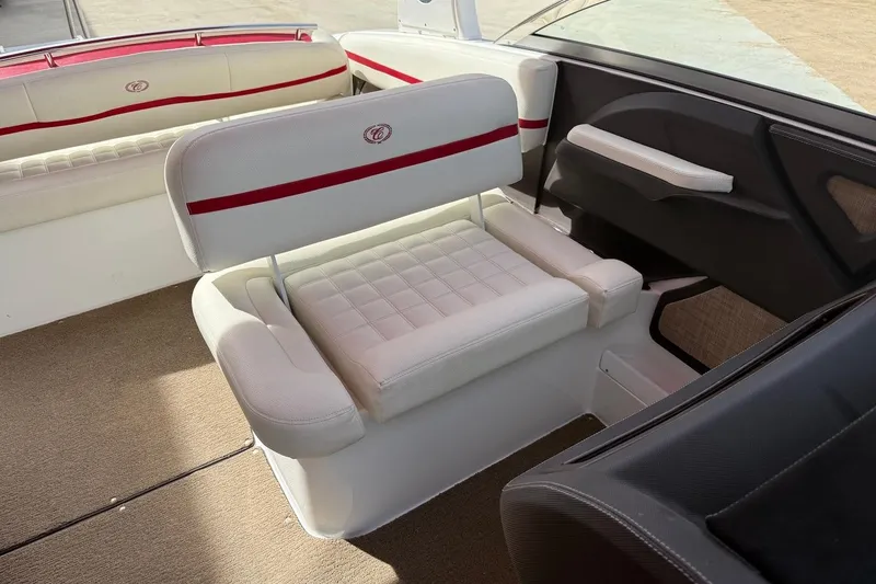 Slide: The Image of Interior of 2017 Cobalt R3 WSS Surf boat with white and red seating. - 17
