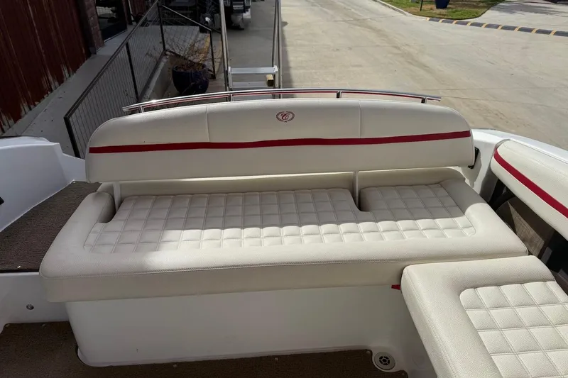 Slide: The Image of 2017 Cobalt R3 WSS Surf boat with white and red cushioned seating. - 18