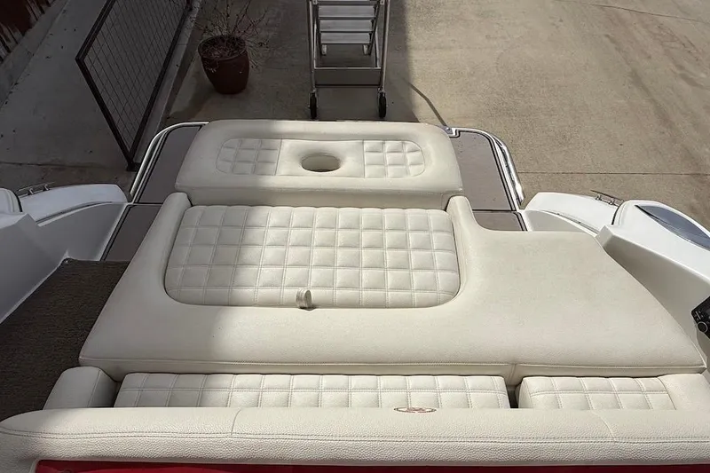 Slide: The Image of 2017 Cobalt R3 WSS Surf boat with cushioned seating and sun pad. - 5