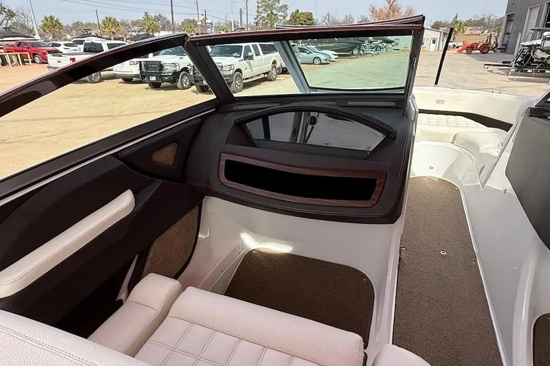 Slide: The Image of 2017 Cobalt R3 WSS Surf boat interior with seating and dashboard view. - 8