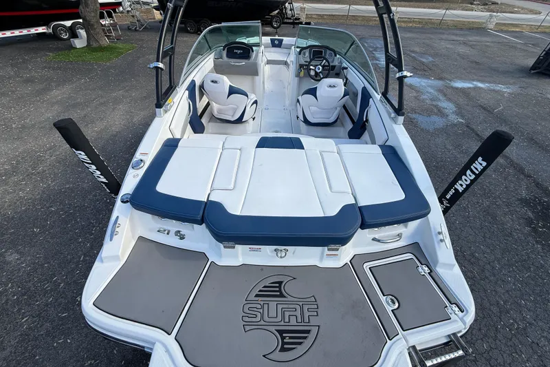 Slide: The Image of 2019 Chaparral 21 H2O Surf boat with sleek interior and comfortable seating. - 5