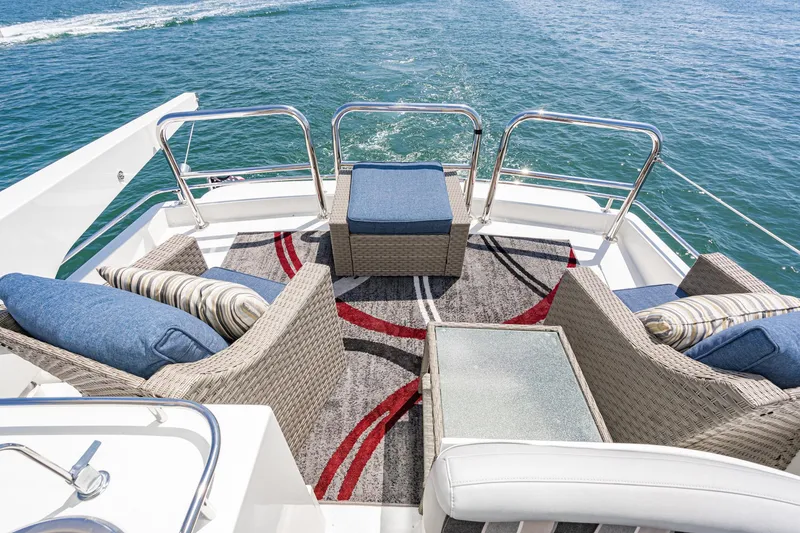 Slide: The Image of Luxurious seating area on 2006 Navigator 5100 yacht with ocean view. - 17