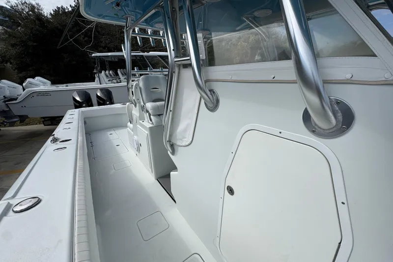 Slide: The Image of 2016 Freeman 37VH boat interior with seating and storage compartments. - 26
